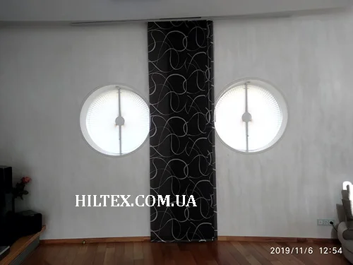 Шторы от солнца на арочном окне 